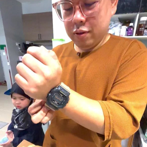 Person wearing a watch in a store setting