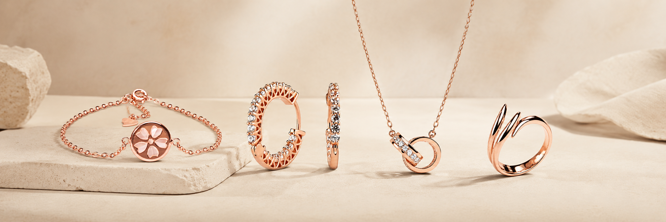 Curated jewellery pieces on a soft beige background for The Wola jewellery collection