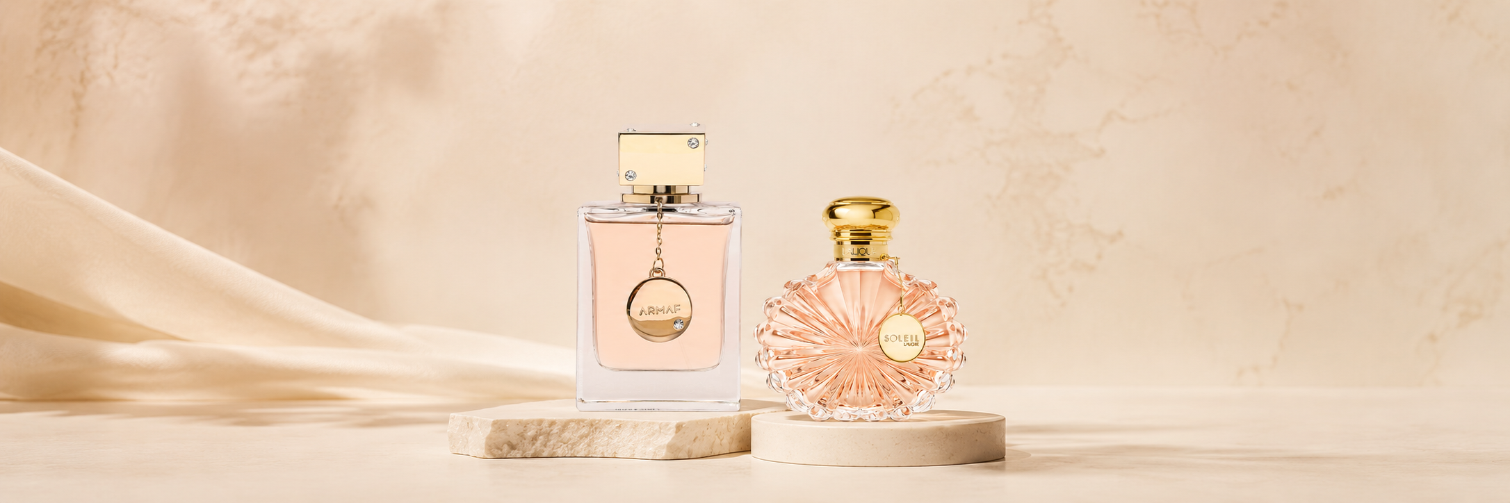 Curated perfume bottles arranged on a soft beige background for The Wola perfume collection