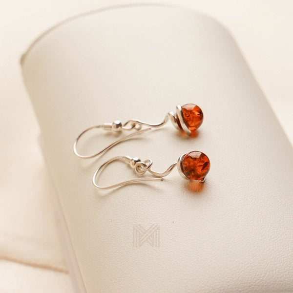 MILLENNE Multifaceted Baltic Amber Pill Silver Earrings with 925 Sterling Silver