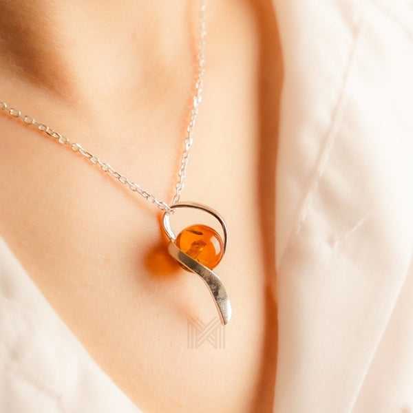 MILLENNE Multifaceted Baltic Amber Shell Encapsuled Silver Pendant with 925 Sterling Silver