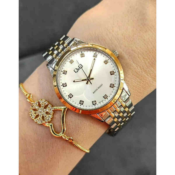Q&Q Watch by Citizen QZ81J401Y Women Analog Watch with Silver Stainless Steel Strap